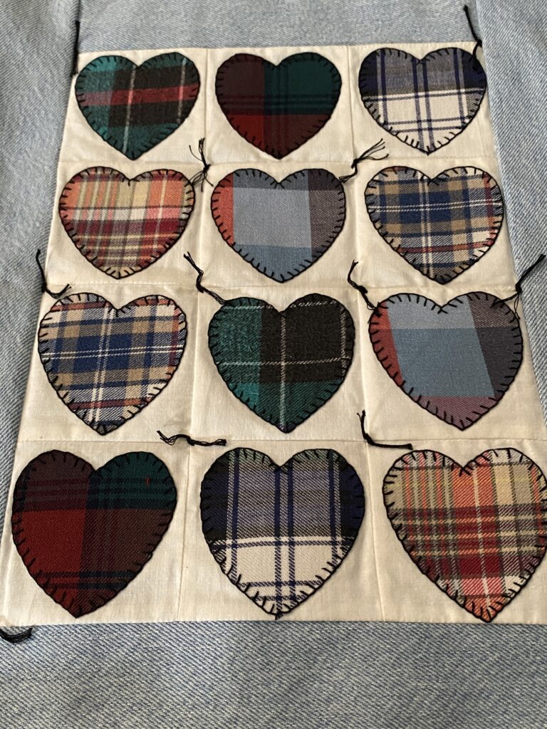 easy mini quilt made with my husband's old flannel shirts and jeans